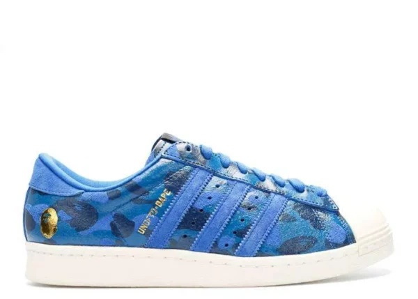 adidas-superstar-bape-blue-camo.webp ADIDAS SUPERSTAR BAPE ‘BLUE CAMO’