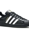adidas-superstar-core-black-white-1.webp ADIDAS SUPERSTAR ‘CORE BLACK WHITE’