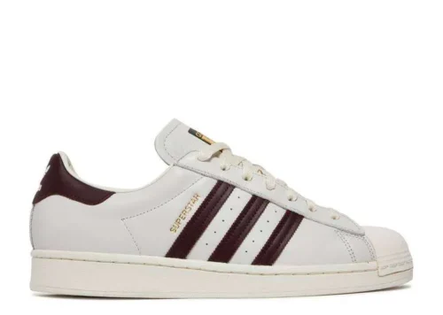 adidas-superstar-off-white-maroon.webp ADIDAS SUPERSTAR ‘OFF WHITE MAROON’